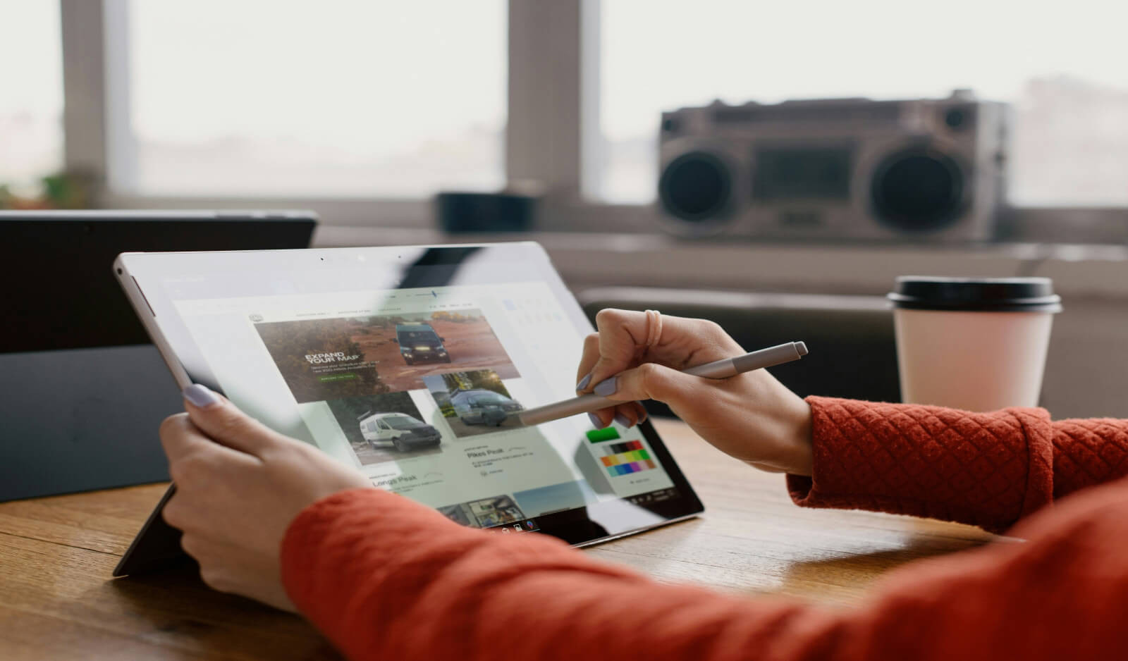 Image of designer creating a website